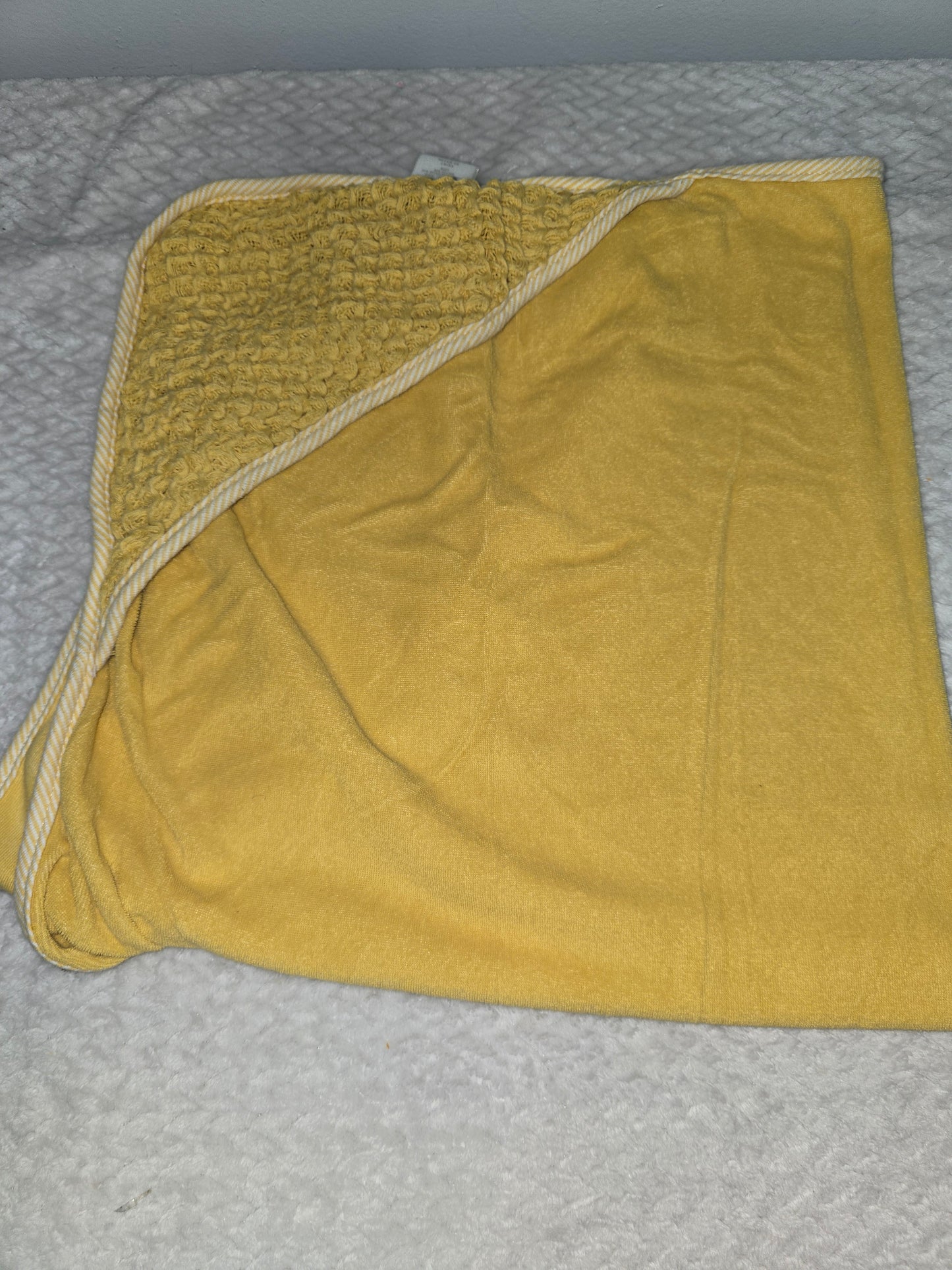 Yellow bath towel